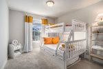 Vibrant Kid`s Room with a Twin-over-Full Bunkbed and a Trundle Bed 